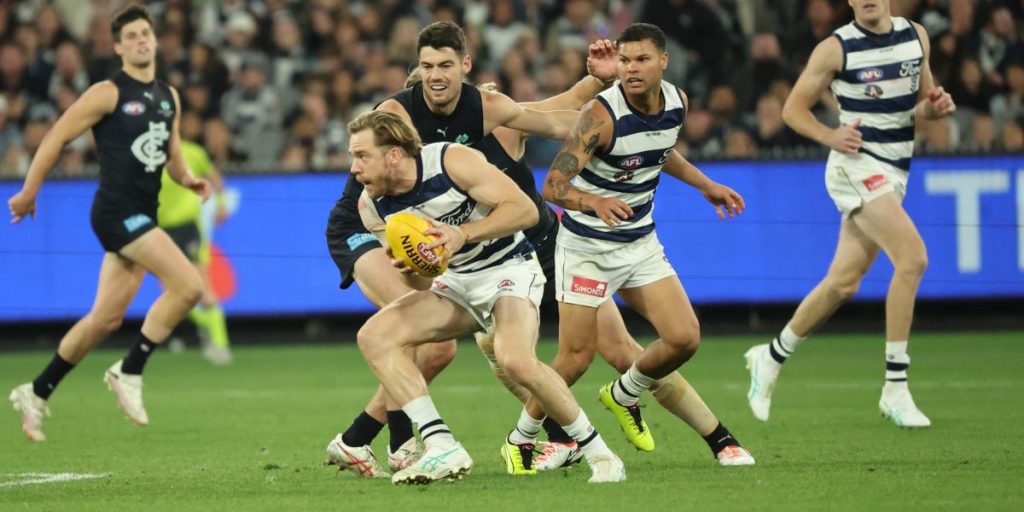 Cats hold back Guthrie