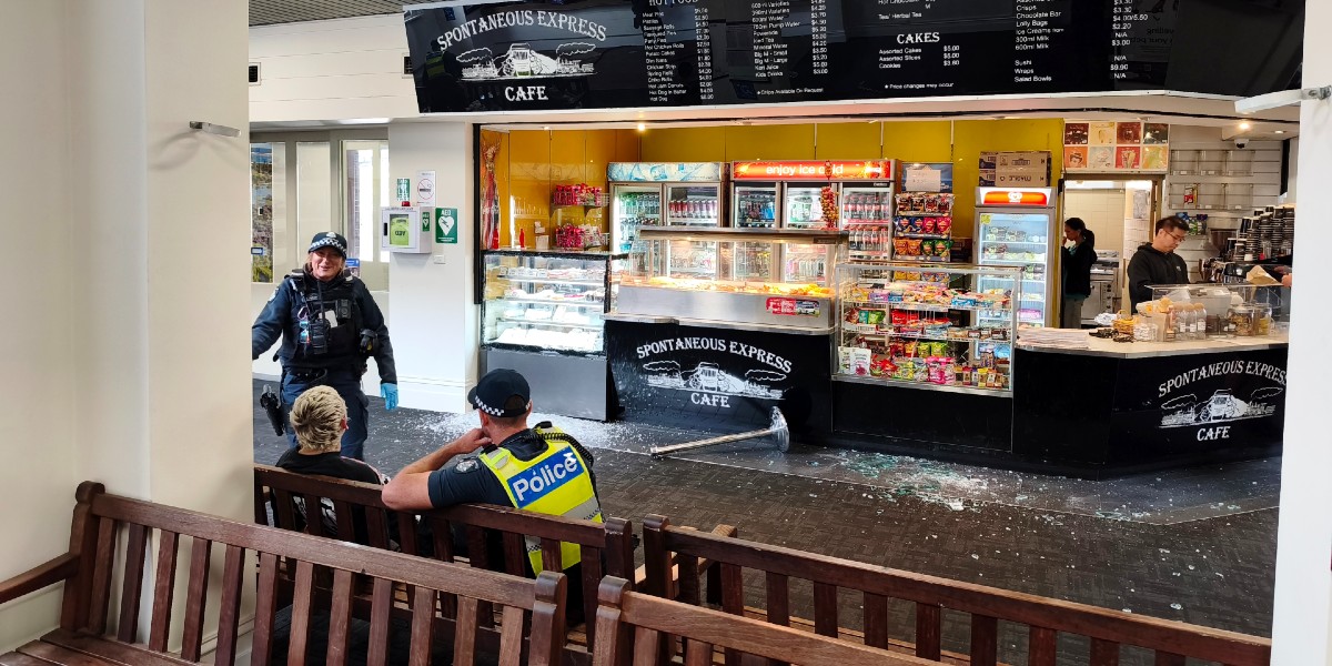 Woman charged over station damage